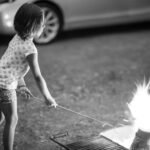 Is camping an appropriate way to spend a summer holiday inexpensively with young children?